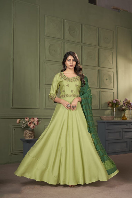 Heavy Green Maslin gown with embroidery work and Banaras dupatta