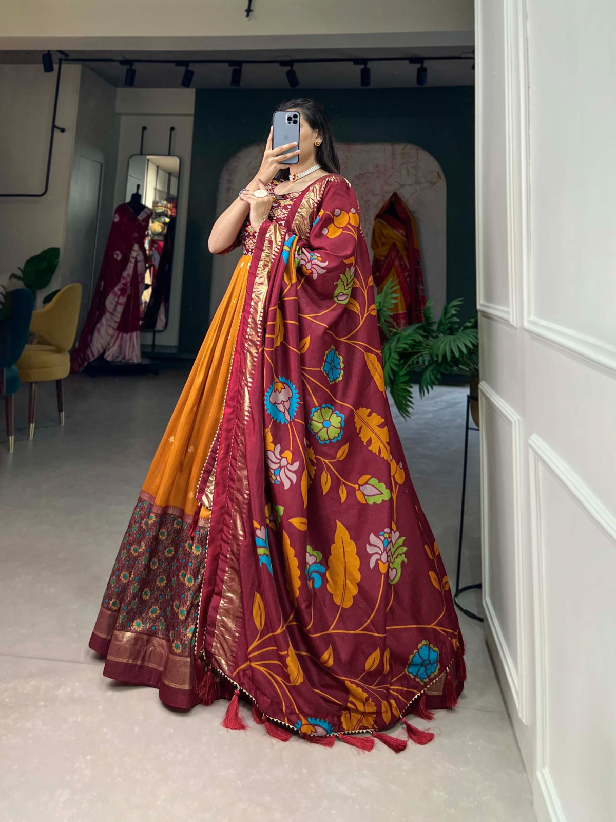 Tussar silk foil printed gown with intricate patola and floral print patterns