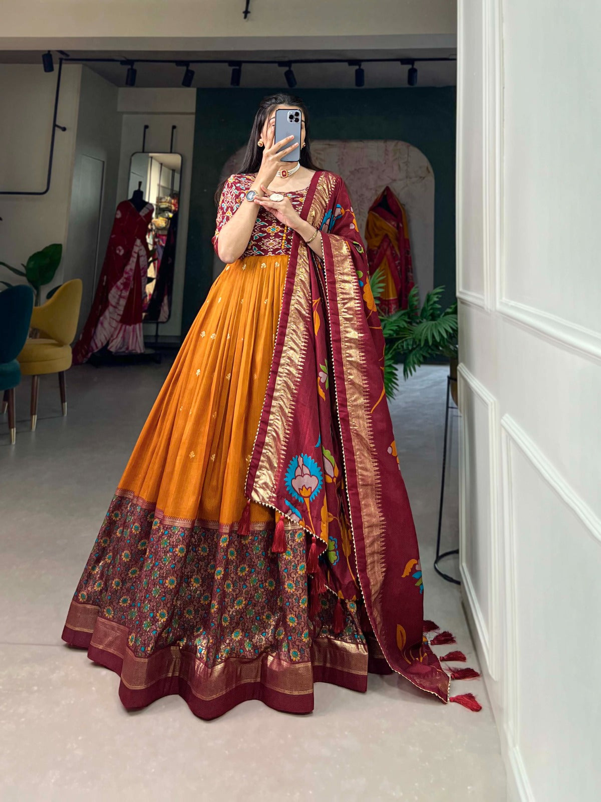 Tussar silk foil printed gown with intricate patola and floral print patterns