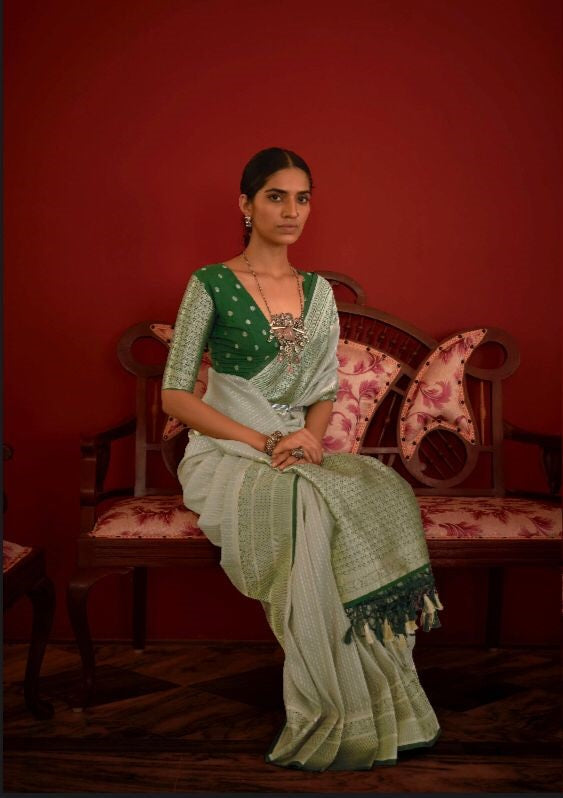 Beautiful Green Designer Saree with heavy thread work and dark green blouse