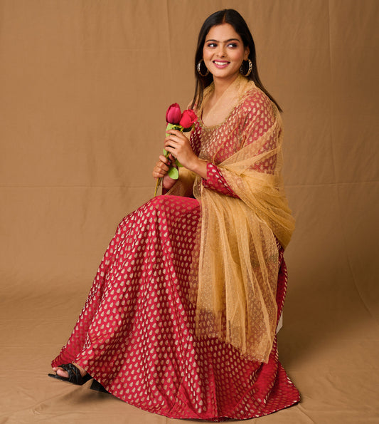 Banarasi style marron gown with zari and buta lace