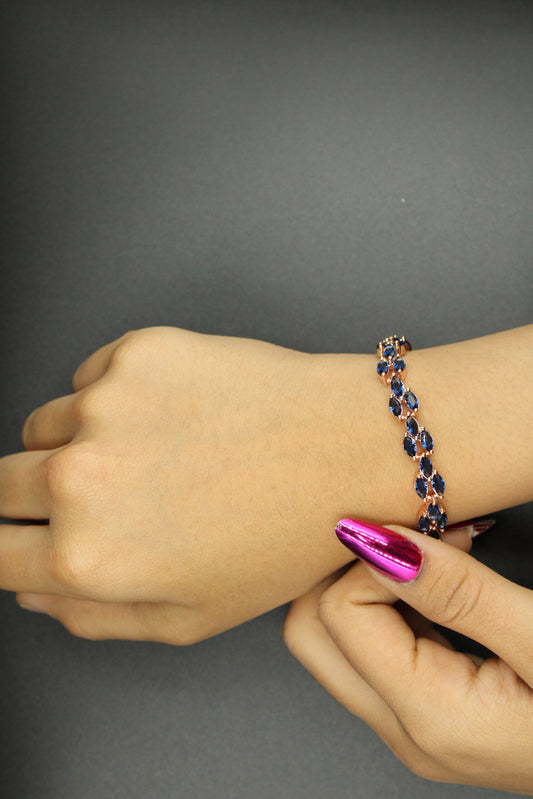 Classic design gold plated bracelet with Dark blue stones
