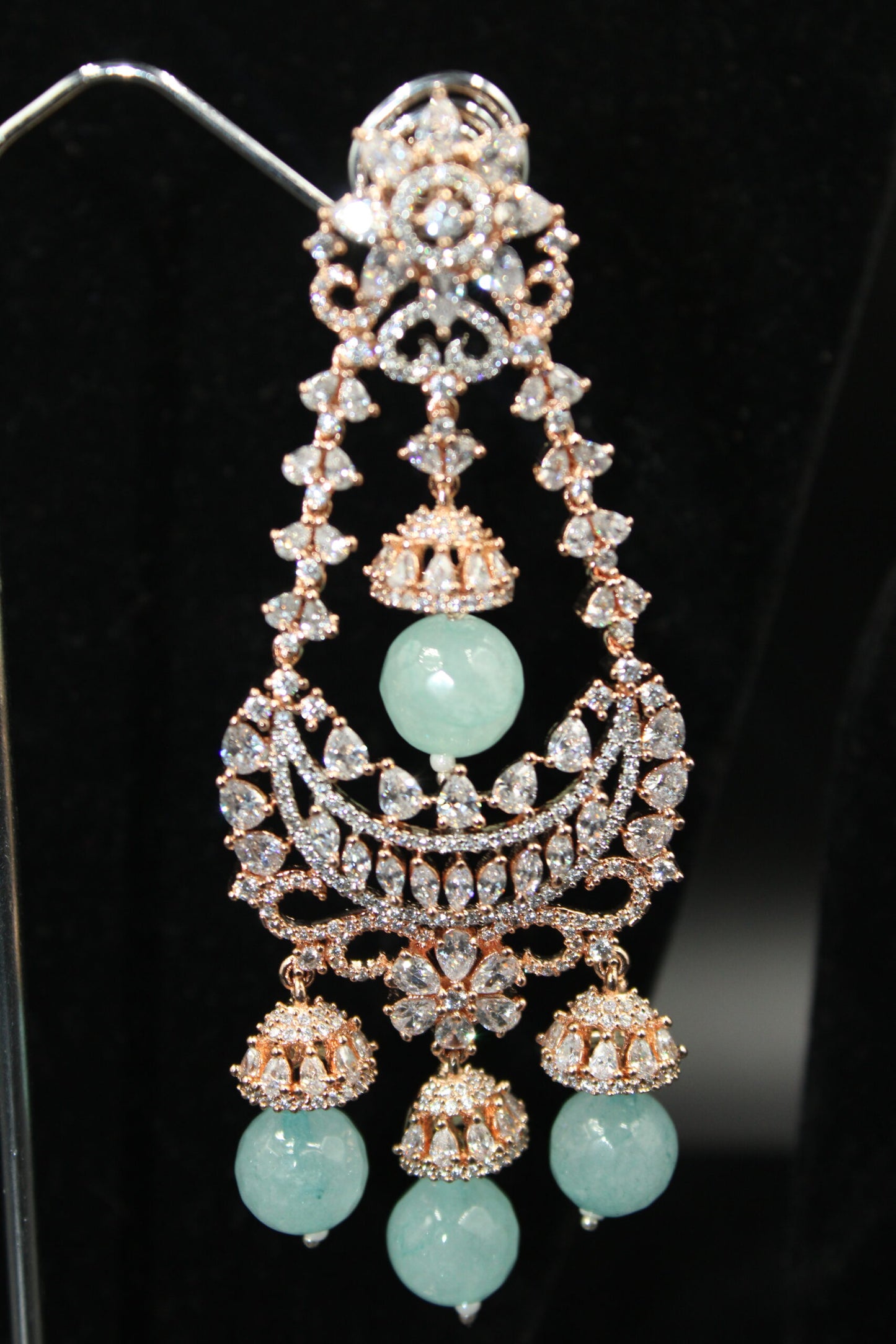 Rose-gold plated sky blue stones Jhumka American Diamond earrings