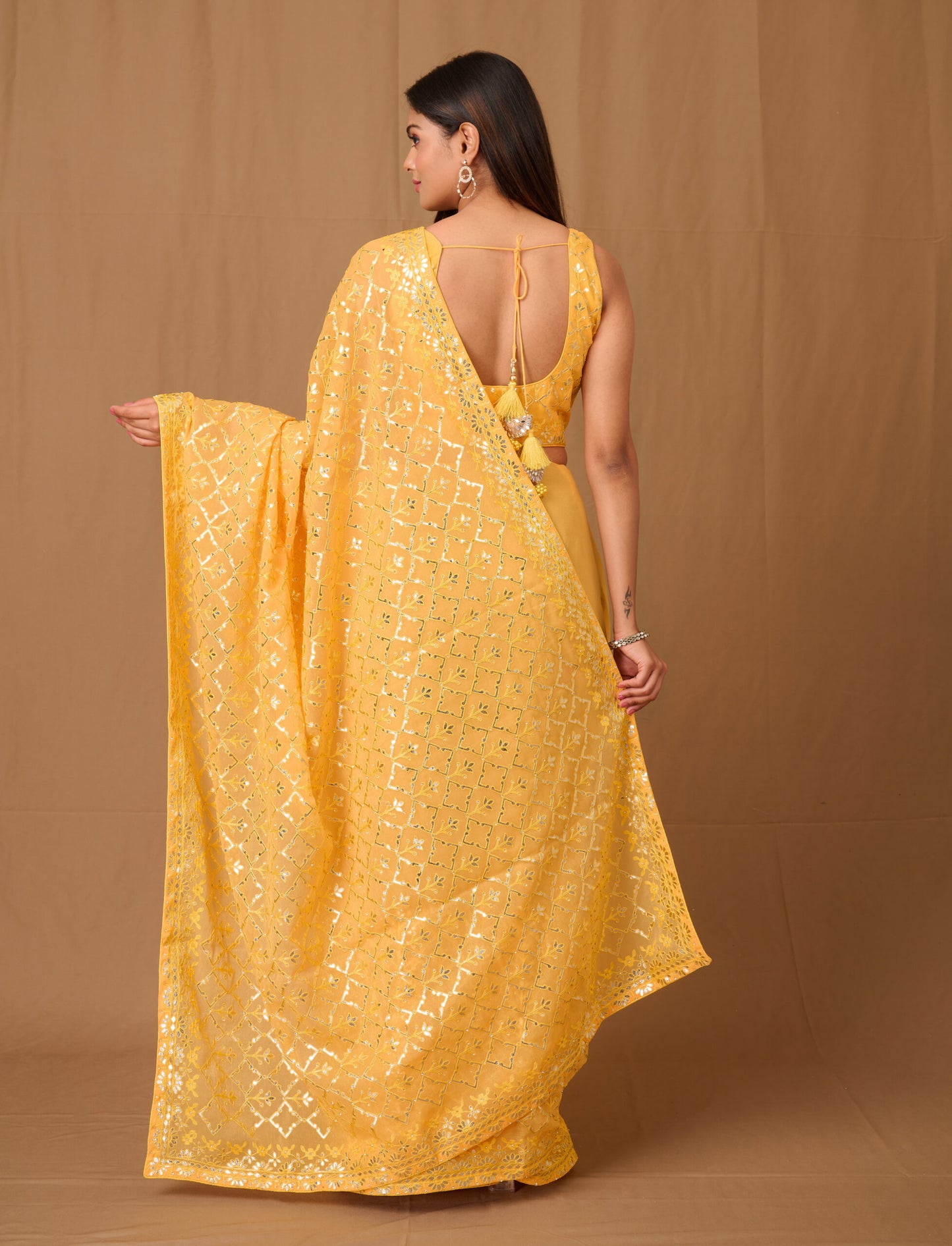 Beautiful yellow heavy work Designer saree with gota patti and blouse with tassels